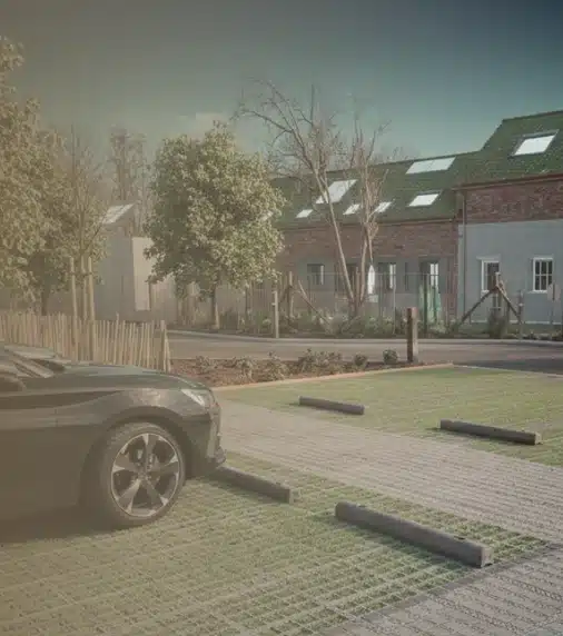 Stop-roues plastique recyclé sur parking pavé et gazon